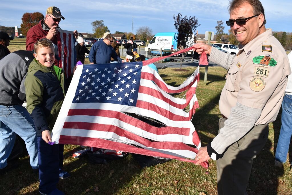 Members of local Boy Scout troops retire American flags - Worcester ...