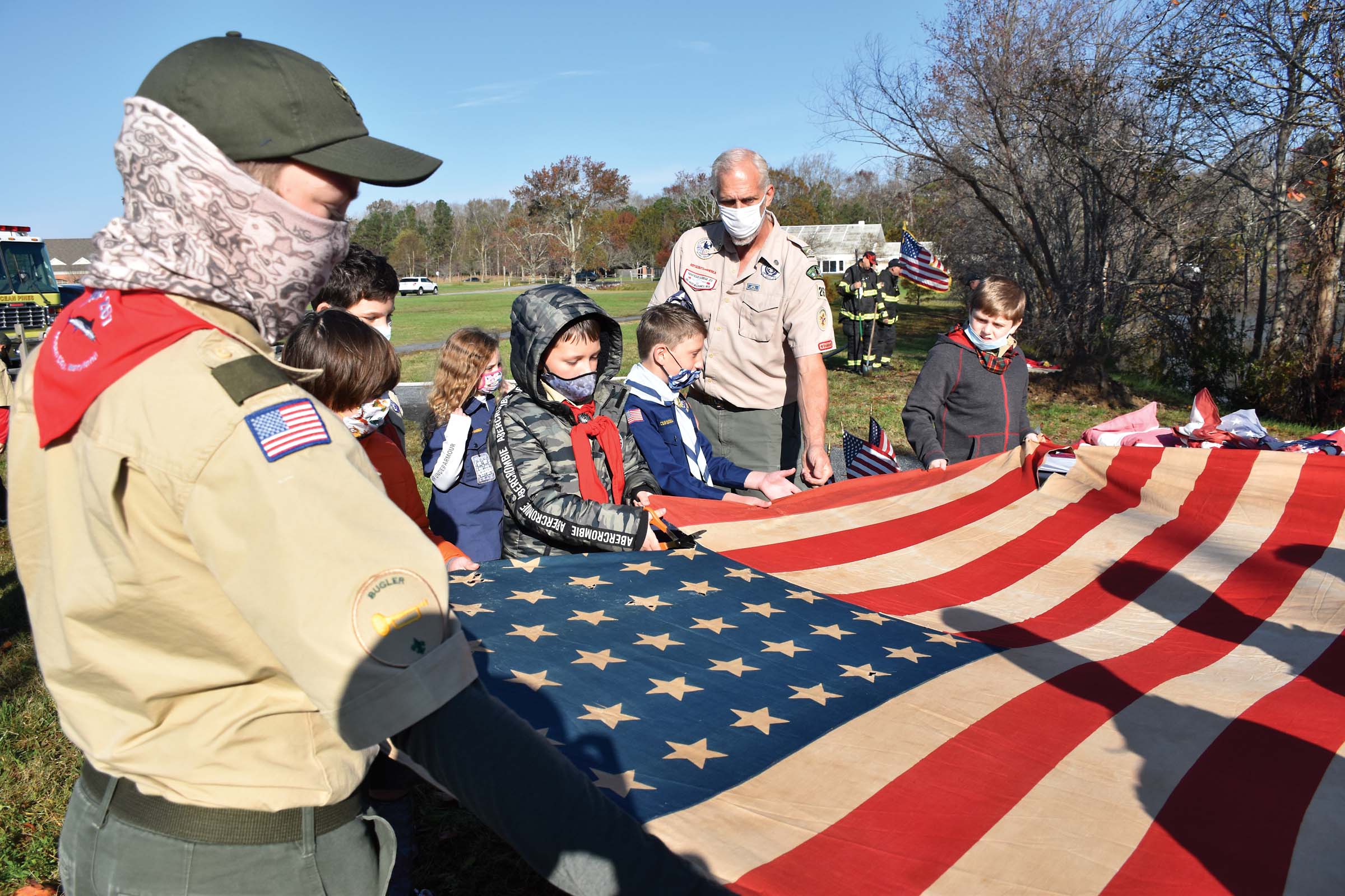 Local scouts conduct proper U.S. flag retirement in Pines - Worcester ...